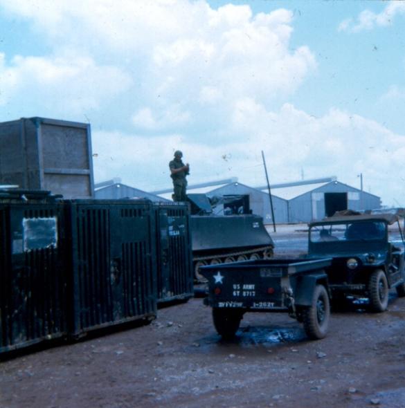 Outside The Guard Quarters With The 71st Trans. Bn. Consolidated Maintenance  Buildings In The Background 
