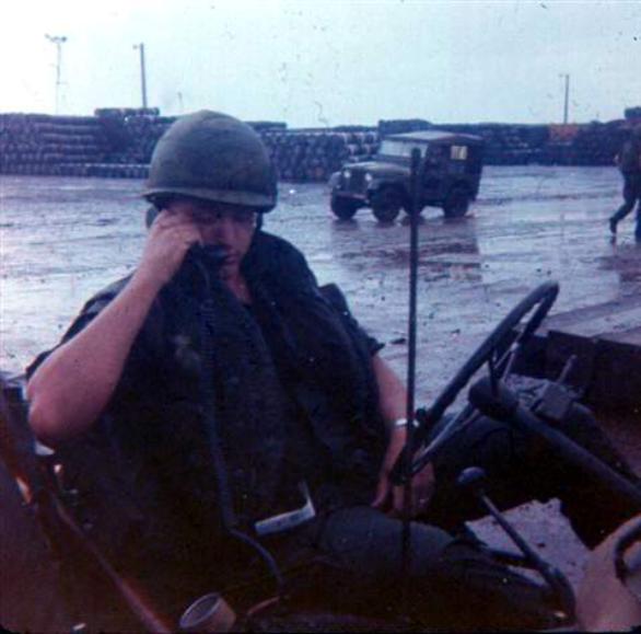 Sgt. Krabbenhoeft - Note All The Barrels Stacked In The Background - Lots Of Agent Orange