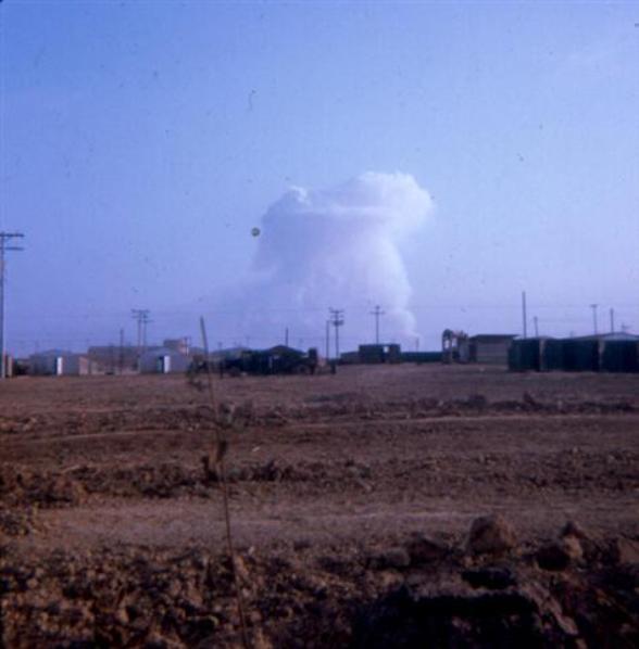 Left - Guys From The 71st On The Fence Line Next to Bearcat Road - 71st Received Incoming Fire The Morning Of February 2, 1968 - Right - This  Photo Was Taken From The Fence Line Looking Over The 71st - Notice The Smoke Clouds From The Ammo Dump Blowing Up - Morning Of Feburary  2, 1968 