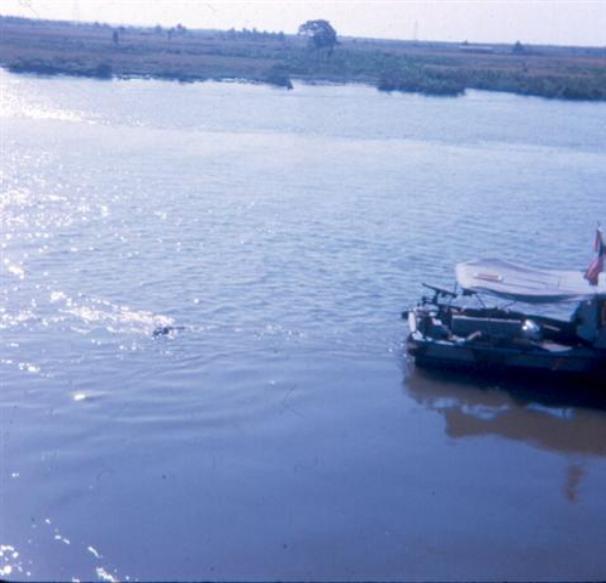 River Patrol Boat Towing A Dead VC