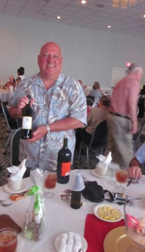 Charlie Busacca Holding some Illegal wine. - Photo Courtesy of David & Roberta McNaught