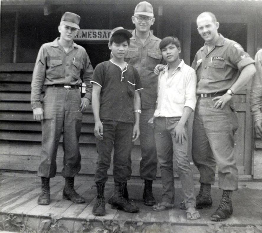 Left To Right  - Larry Taylor - David McNaught - Nelson Ouelette - Civilian Workers In Front