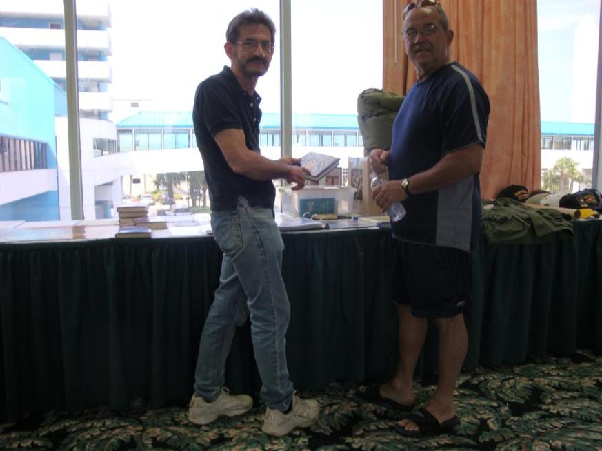 Al Furtado & Nelson Ouellette Looking Over The Auction Items - Photo courtesy of Al & Carol Furtado.