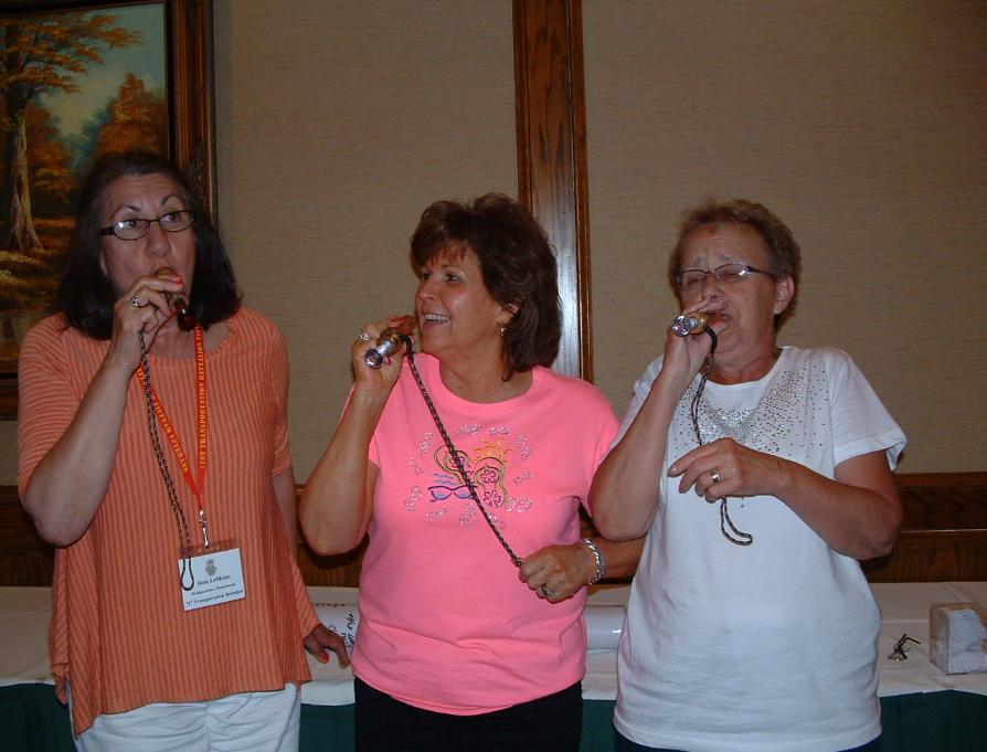 Rose LeMoine - Kay Shook - Jan Richmond - Playing With The Duck Calls They Won - LOL - Photo courtesy of Randy & Jan Richmond.