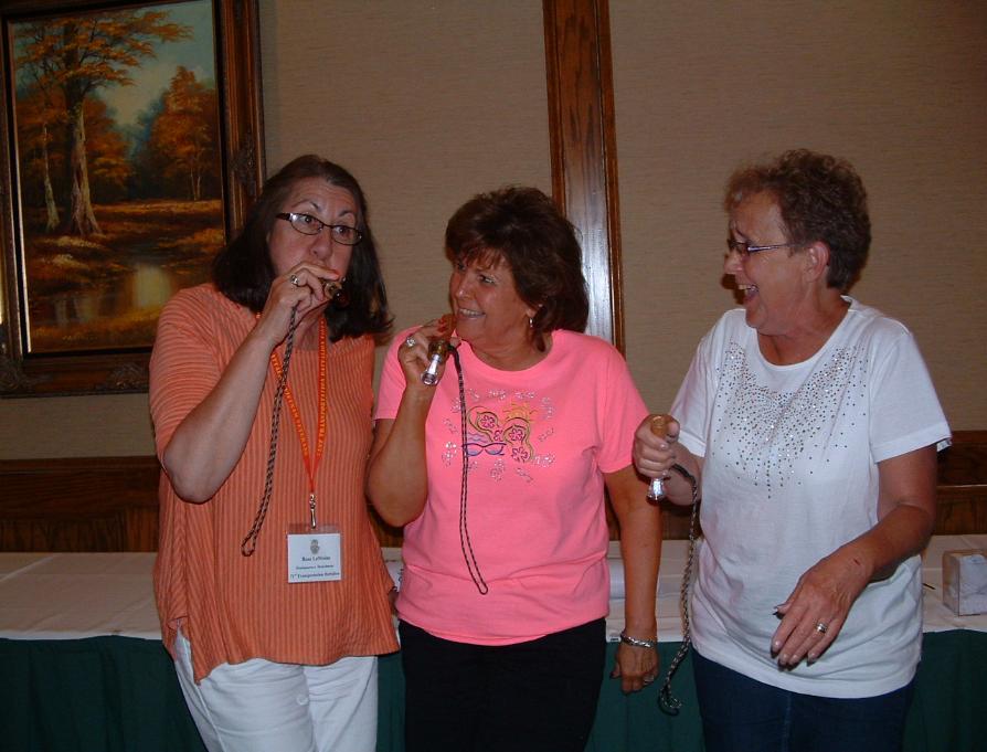 Rose LeMoine - Kay Shook - Jan Richmond - Playing With The Duck Calls They Won - LOL - Photo courtesy of Randy & Jan Richmond.