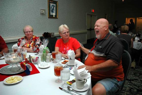 Doug & Sandy Elliott - Don't know what Doug said, but he sure is getting a big laugh out of it; Sandy doesn't look too happy about it.  LOL - Photo courtesy of Bob & Bernie Grier.