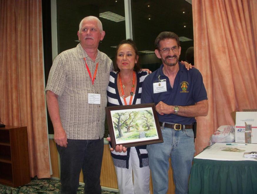 David McNaught is the high bidder on the painting of Brookgreen Gardens  done by Bernie Grier. - Photo courtesy of Bob & Bernie Grier.