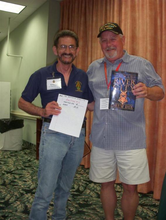 Randy Richmond had the winning bit for the book, The Rescue Of River City by Drew Dix - Photo courtesy of Bob & Bernie Grier.