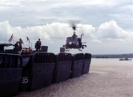 Navy Huey Gunship Landing On Navy Tango Boats At Ben Keo