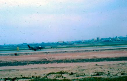 Bien Hoa Air Base - Looks Like A F-105 And A C-130