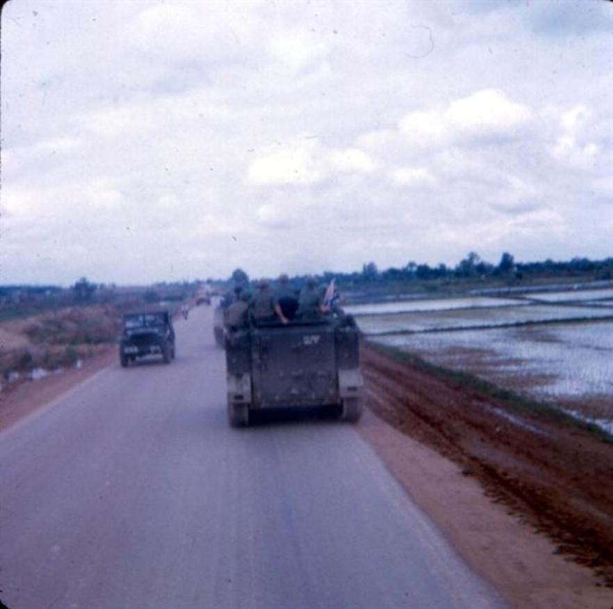 Left Photo - Me And Warren Schaub - Saigon University In Background  - Anyone got a light? - Right Photo -  August 1968 - Bear Cat Road AKA Charlie Road - Heading Towards Camp Camelot And Bearcat - The road is now paved. It wasn't like that when we got here in 67.
