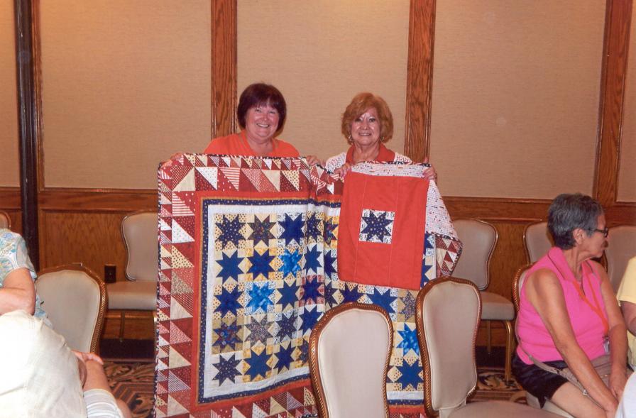 Rose Prado Has The Winning Bid On The Quilt - Photo courtesy of Rose Prado & Carlos Sisneros