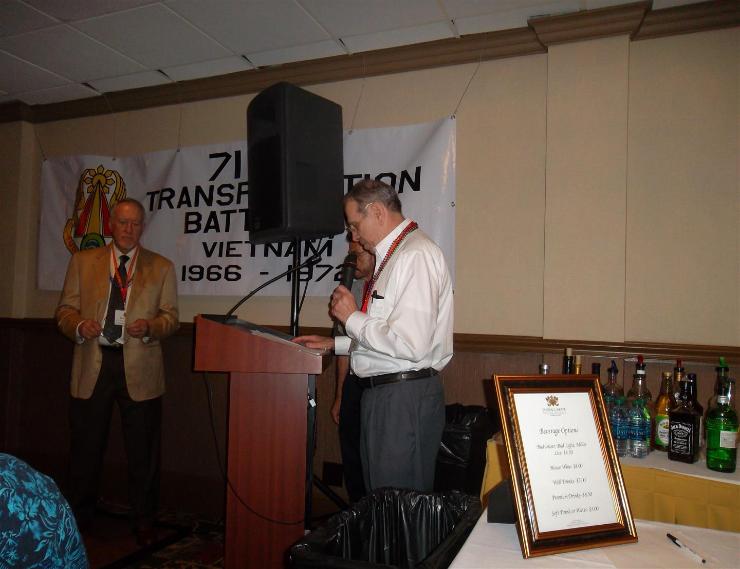 Larry Neuman Reads The Names From The 402nd Transportation Company - Photo courtesy of Al & Carol Furtado.